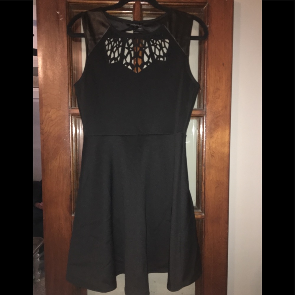 Black cocktail dress, open back, leather detail